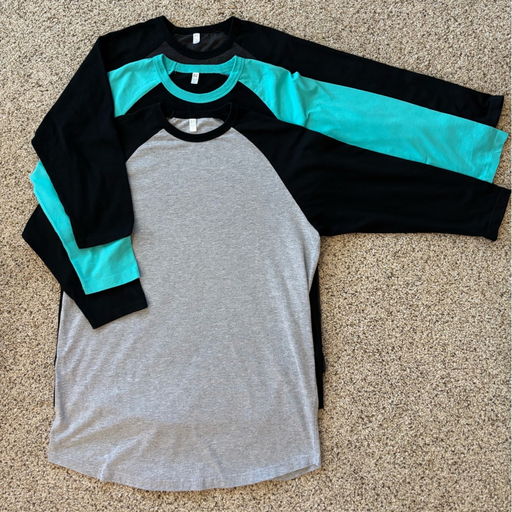 Like New! Set of 3. Dream USA baseball shirts. Never worn. Laundered once. Large